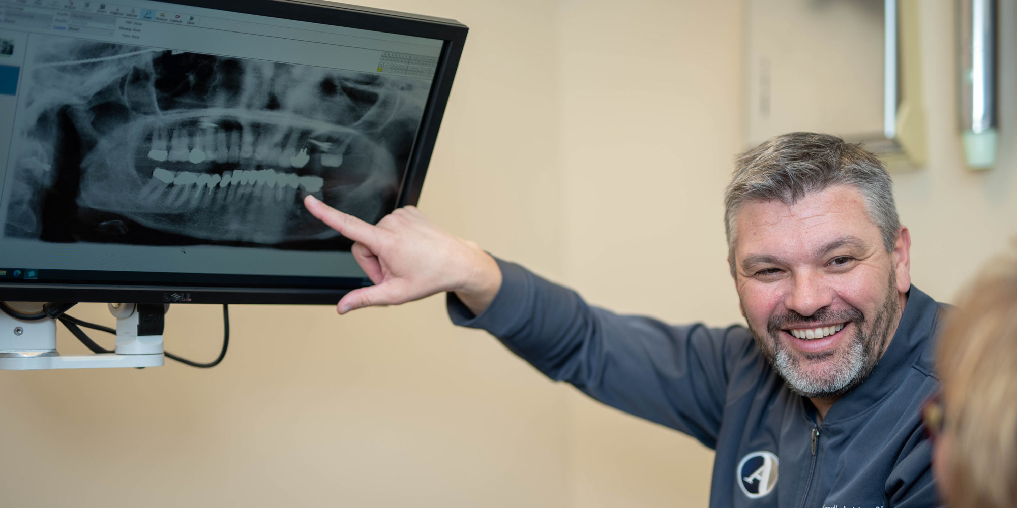Dr. Ackley showing a patient's x-rays